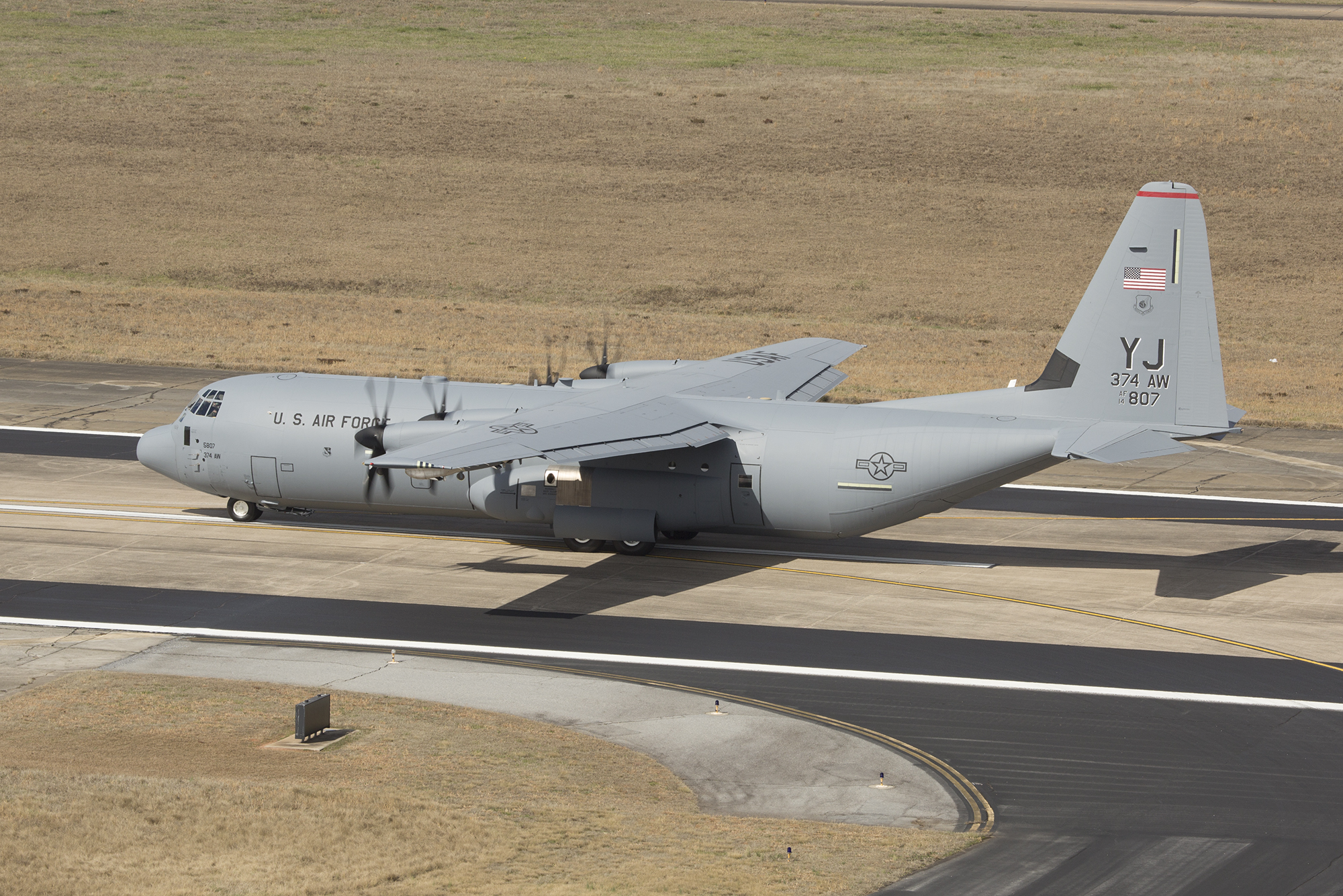 A C-130J SUPER HERCULES taxies down the runway at Lockheed Martin Aeronauti...