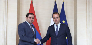Armenia's Defence Minister Suren Papikyan and French Defence Minister Sébastien Lecornu after signing a contract on the delivery of CAESAR artillery systems in June 2024. [Armenian MoD]