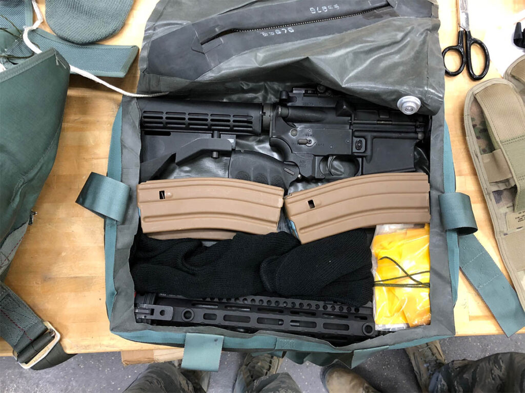 Aircrew Self Defence Weapon, GAU-5A, broken down with two magazines and tucked inside a standard ACES II ejector seat. It takes 30 seconds to assemble. [USAF]
