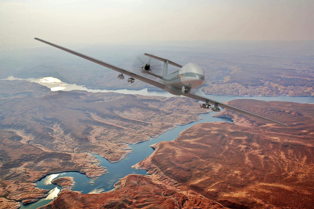 CG render of the Eurodrone in flight, armed with a notional air-to-ground munitions loadout. [Airbus]