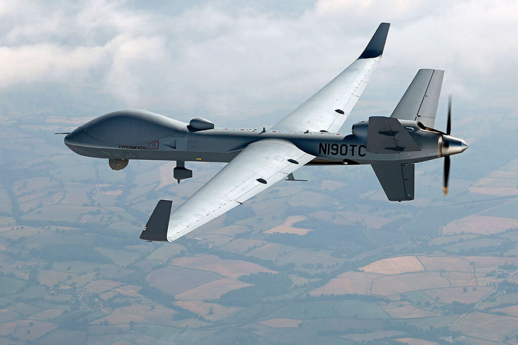 An MQ-9B SkyGuardian flying above the UK during the RAF100 event. The UAV is known as the Protector RG Mk 1 in UK service. [GA-ASI]
