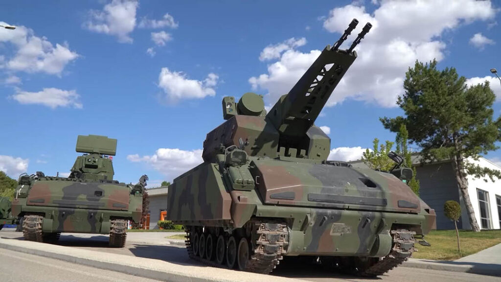 The command vehicle (left) and Korkut SPAAG (right) make up the Korkut system. [Aselsan]