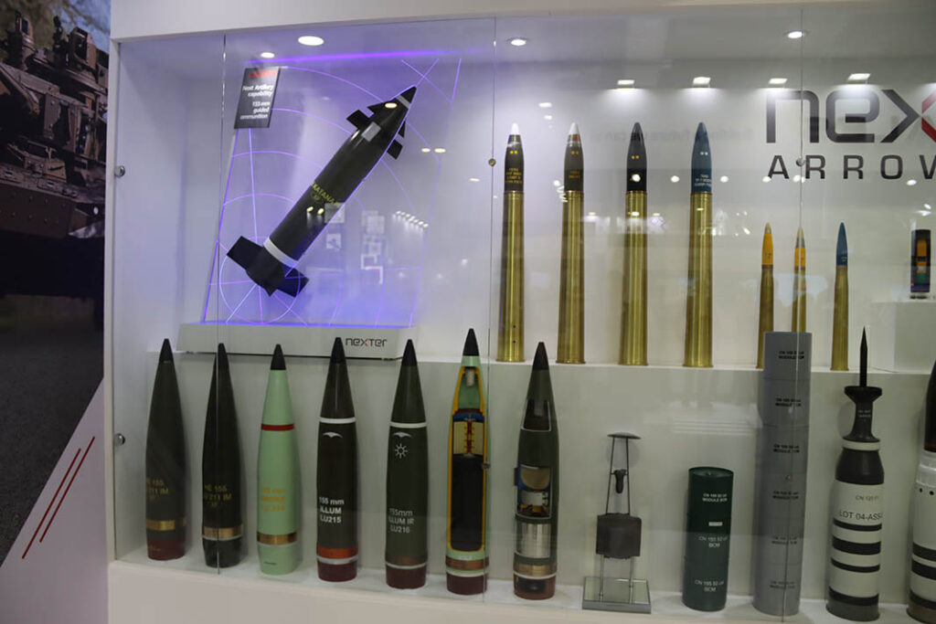 A range of artillery ammunition and modular charges from Nexter (now KNDS France) on display at EDEX 2021. The KATANA round is visible in the top left. (Alexey Tarasov)