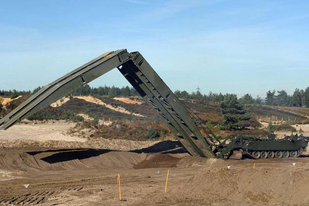 The battlefield utility of the Challenger 3 will depend on the availability of supporting enablers including the Titan AVLB. [Crown Copyright 2007]