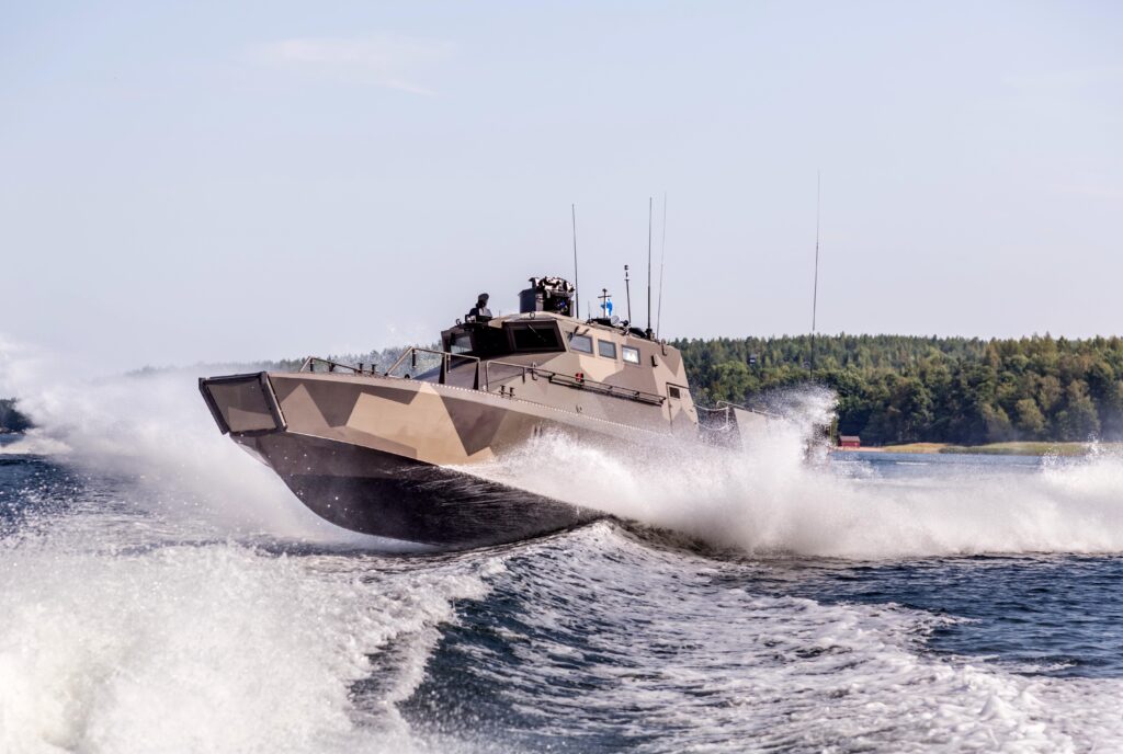 [Photo: The robust and fast Finnish Defence Forces’ own M18 on patrol in rough waters, courtesy Marine Alutech]
