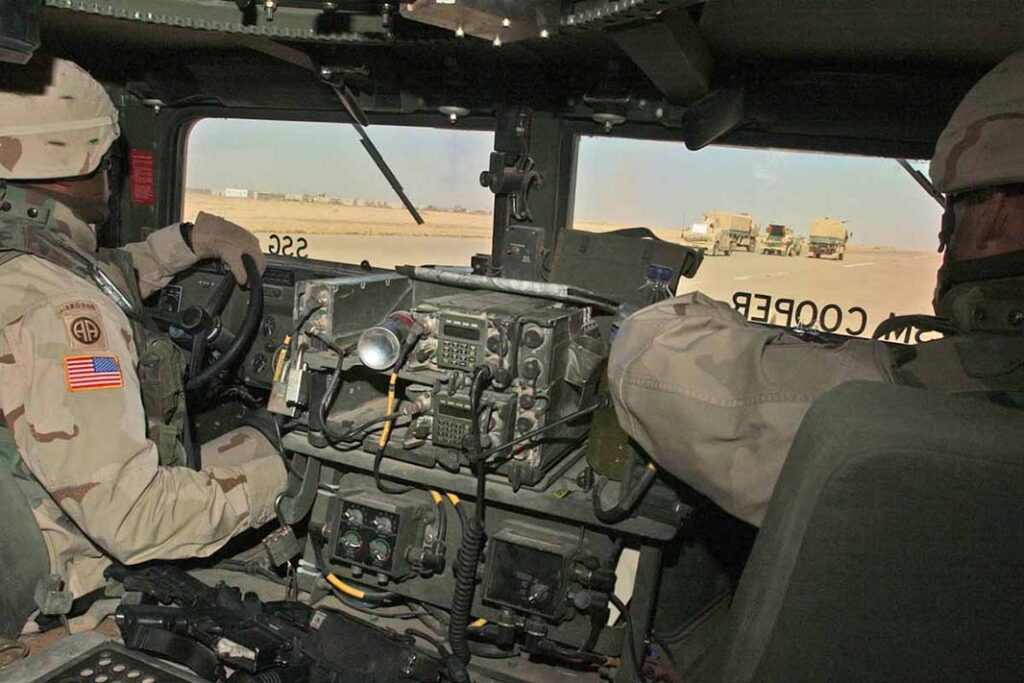 SINCGARS was originally envisaged as a family of radios with specific capabilities, chiefly comprising backpack and vehicular transceivers such as those seen occupying the central console of this US Army AM General High Mobility Multipurpose Wheeled Vehicle. (US Army)