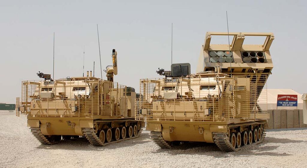 M270 MLRS vehicles at Camp Bastion, Afghanistan, in 2008. The UK’s deployments during the War on Terror led to a move away from area effects, turning the MLRS into a long-range precision strike system. [Crown Copyright 2008/Cpl Ian Houlding]