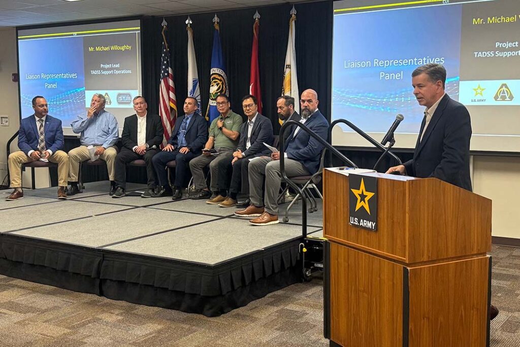 PL TSO, Michael Willoughby, briefs members of PEO STRI global operations Liaison Representatives that are located at major US Army locations across the globe. (US Army/Donnie Ryan)