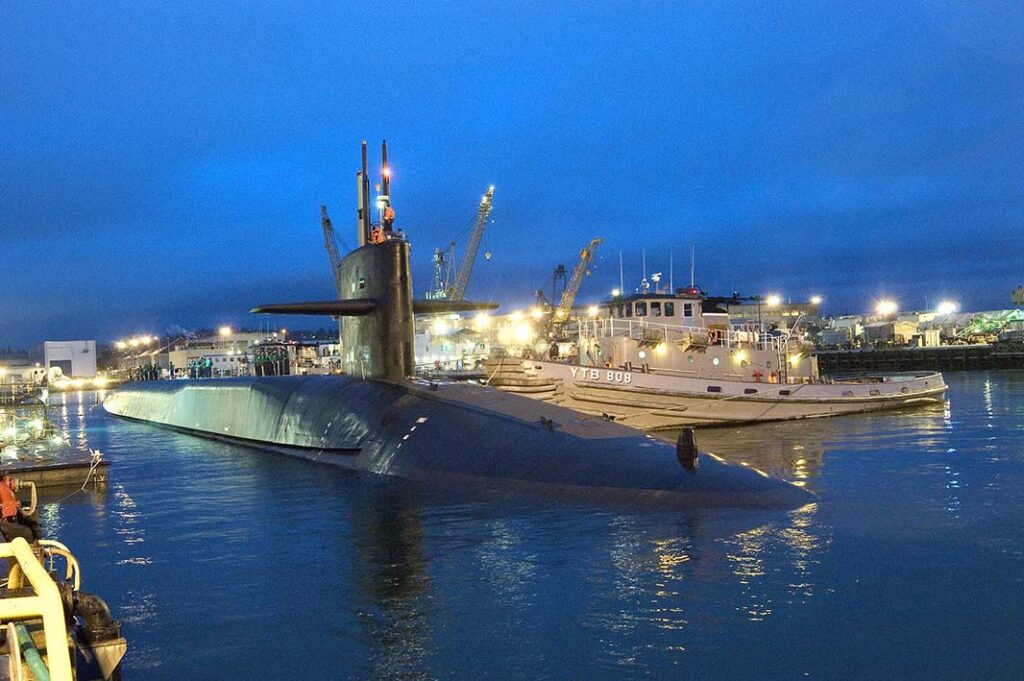 The guided missile submarine USS Ohio (SSGN 726) returning to the Puget Sound Naval Shipyard and Intermediate Maintenance Facility in Bremerton, Washington, after completing sea trials, 19 December 2005. Even such sensitive vessels as the Ohio class were found to have significant Chinese semiconductor presence according to the Govini report. (US Navy/Rick Chaffee)