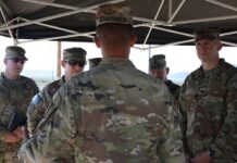US Army Maj Eric Sturzinger, assigned to Artificial Intelligence Integration Center, gives a capability brief during for Project Convergence at Yuma Proving Ground, Arizona, on 20 October 2021. [US Army/Spc Kayla Anstey]