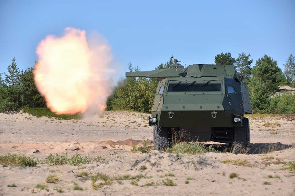 Patria’s CAVS NEMO mortar carrier combines the company’s 6×6 vehicle, mounted with its NEMO 120 mm turreted mortar system, seen here firing in direct-fire mode. (Patria)